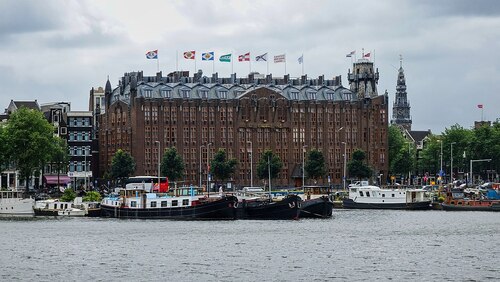Audioguide d’Amsterdam : Explorez le Grand Hôtel Amrâth Amsterdam
